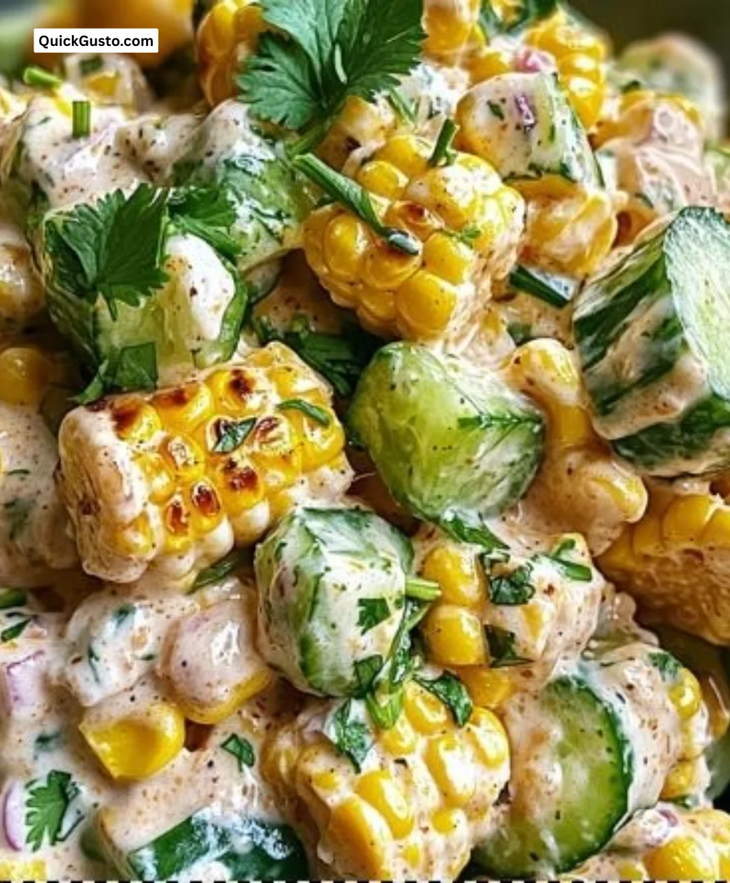 A vibrant bowl of Sunny Street Corn Creamy Cucumber Salad for summer refreshment