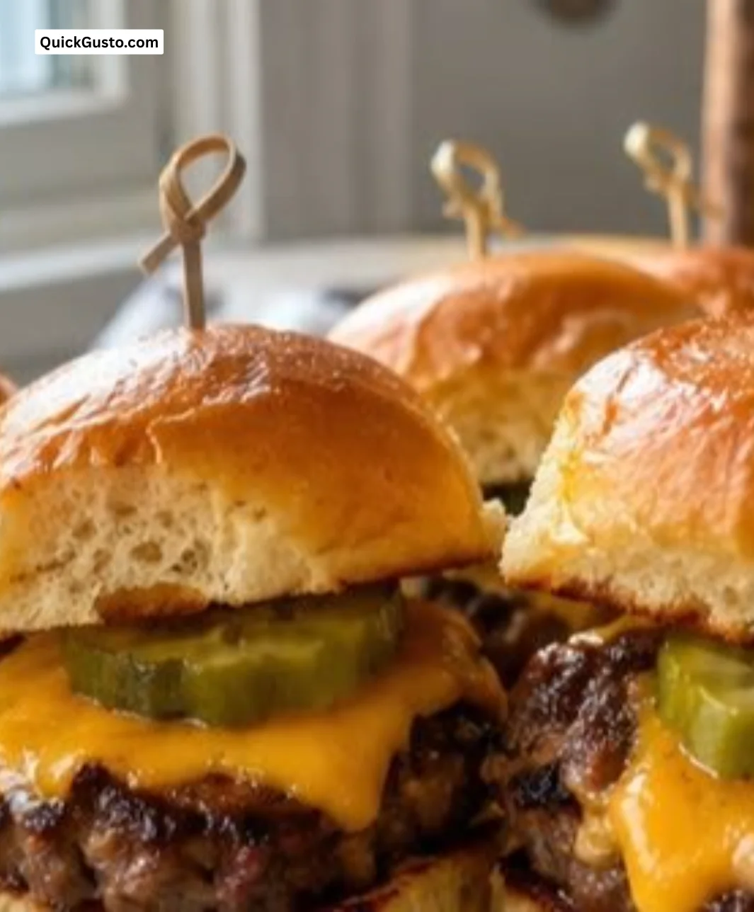 A variety of bite-size appetizers for game day, including sliders and dips.