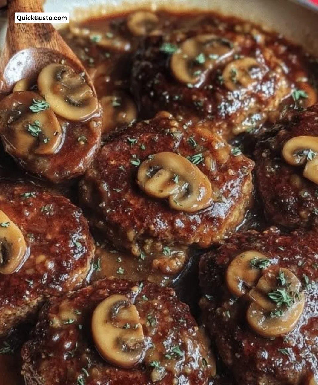 Ultimate Salisbury steak with mushroom gravy served on a plate